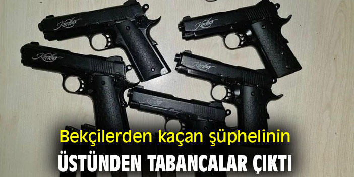 Bekçilerden kaçan şüphelinin üstünden tabancalar çıktı