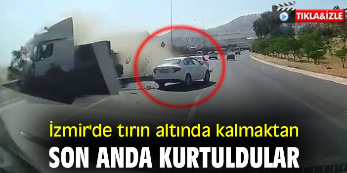 İzmir'de tırın altında kalmaktan son anda kurtuldular