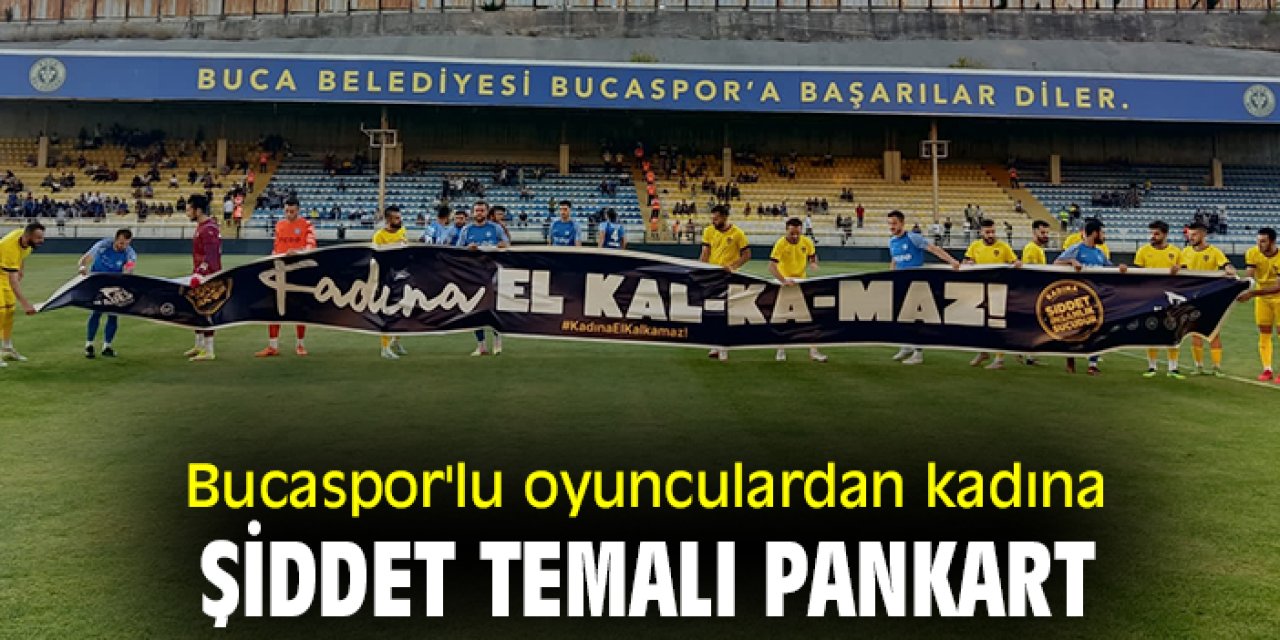 Bucaspor'lu oyunculardan kadına şiddet temalı pankart