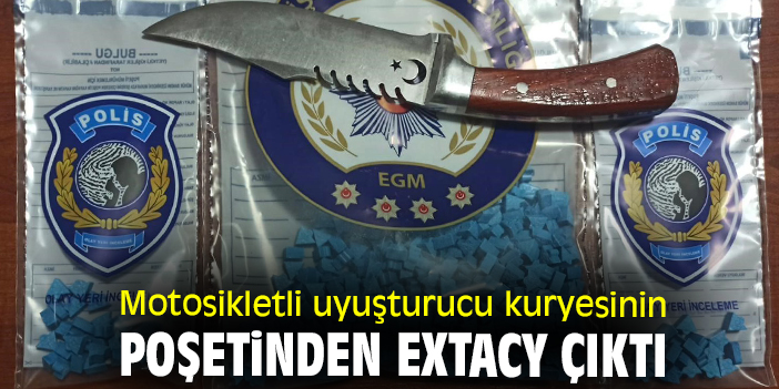 Motosikletli uyuşturucu kuryesinin poşetinden extacy çıktı
