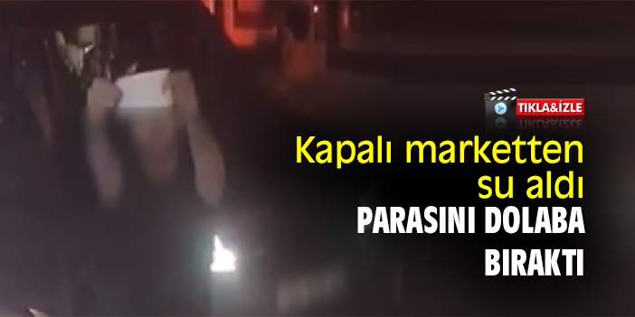 Kapalı marketten su aldı, parasını dolaba bıraktı