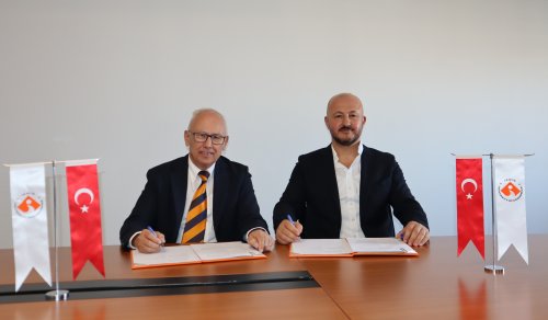 izmir-ekonomi-universitesi-ile-bilsev-group-arasindaki-is-birligine-iliskin-protokol-rektor-prof-dr-murat-askar-ve-bilsev-group-yonetim-kurulu-baskani-tevfik-bilsev-tarafindan-imzalandi.jpg