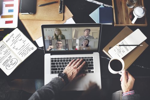 businessman-video-conference-call-while-working-from-home-during-coronavirus-pandemic-scaled.jpg